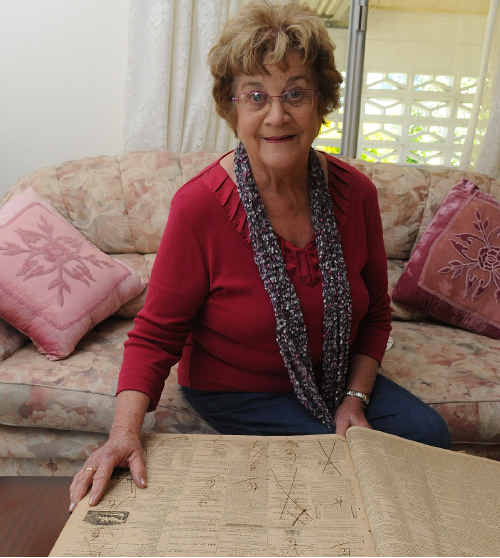 HISTORY SEARCH: Ena Hehir looks over a copy of the 1872 Gympie Times to find information about Mary MacKillop. HISTORY SEARCH: Ena Hehir looks over a copy of the 1872 Gympie Times to find information about Mary MacKillop.